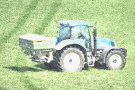 Tractor Spreading Fertilizer